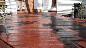 Deck pressure washed and stained by Global Painting RVA